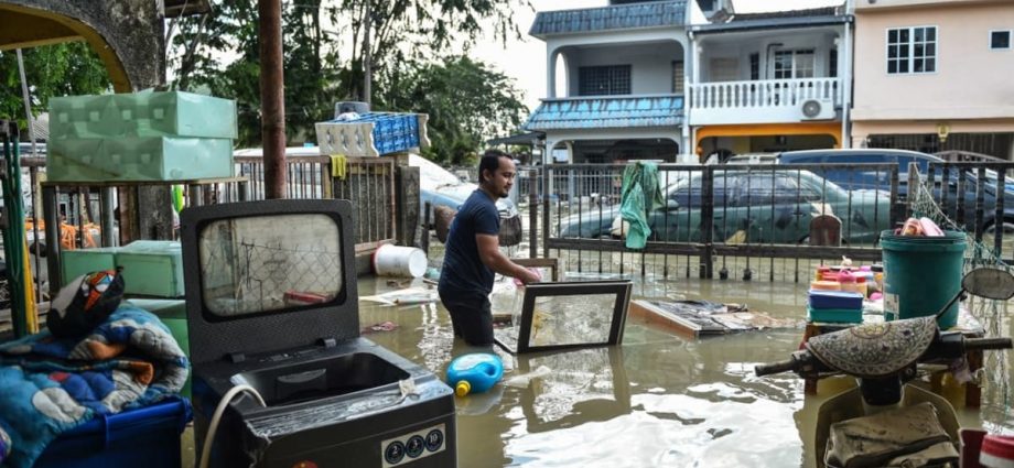 Some in Malaysia’s flood-prone areas question move to hold election during the monsoon