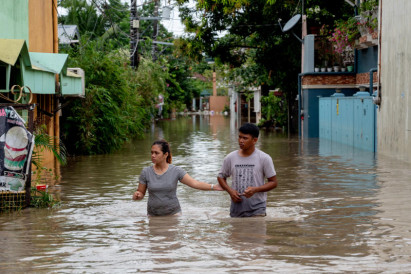 Tropical storm batters Philippines capital before exit