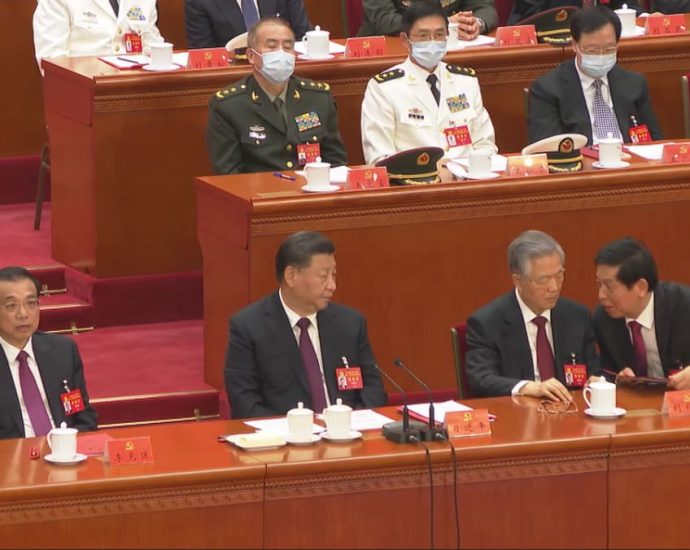 What happened before Hu Jintao was escorted out of Congress? CNA captured rare footage in lead-up