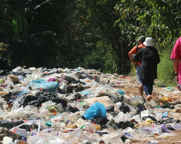 Villagers call for help as dumped tourist garbage blocks road