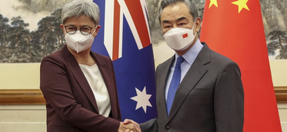 China, Australia ministers meet as trading partners seek to restore ties