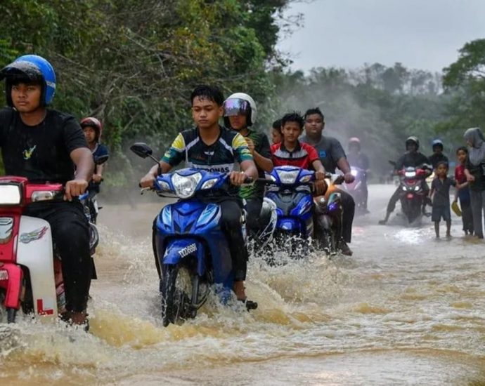 Malaysia floods force more than 66,000 people into relief centres; heavy rain expected in Johor, Pahang