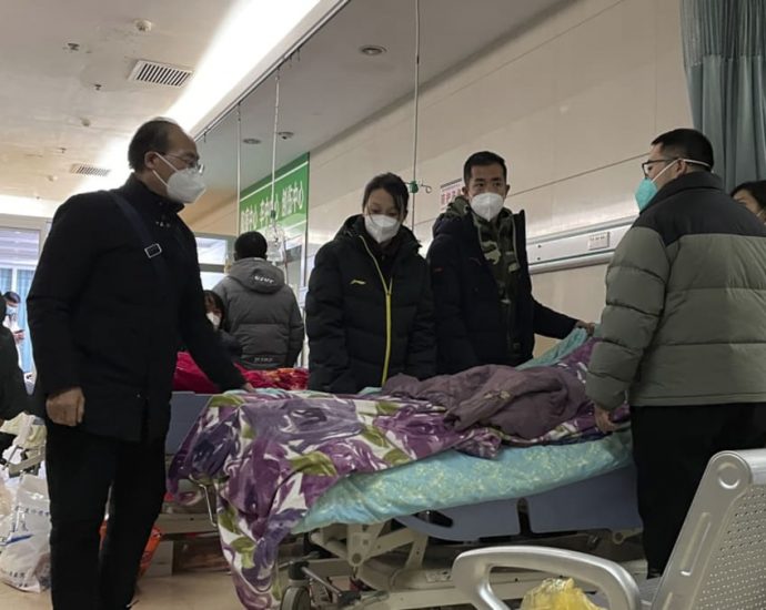 Packed ICUs, crowded crematoriums: COVID-19 roils Chinese towns