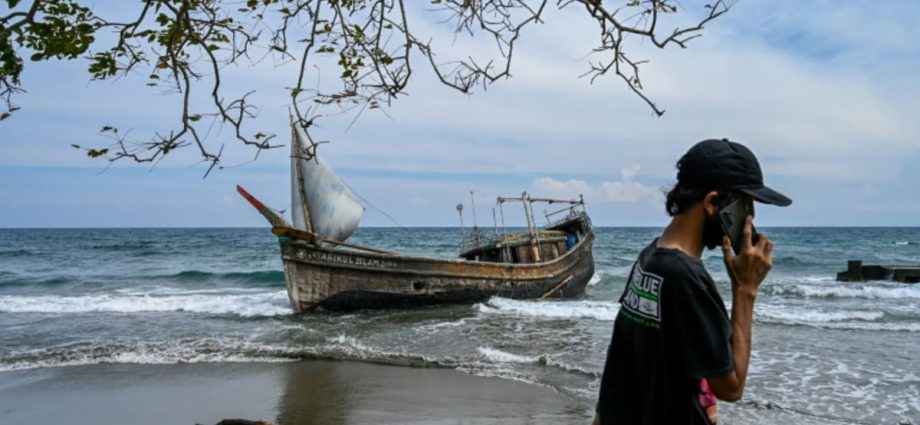 Rohingya refugee boat lands in Indonesia after a month at sea