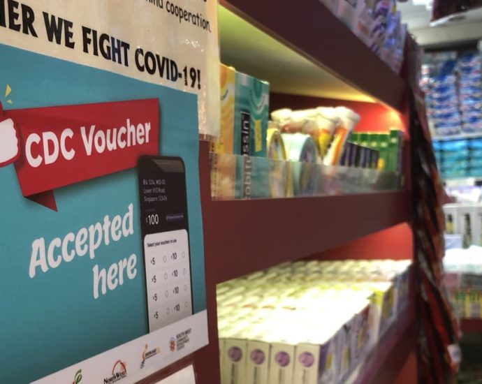 S0 in CDC vouchers for each Singaporean household in January; half can be used at supermarkets