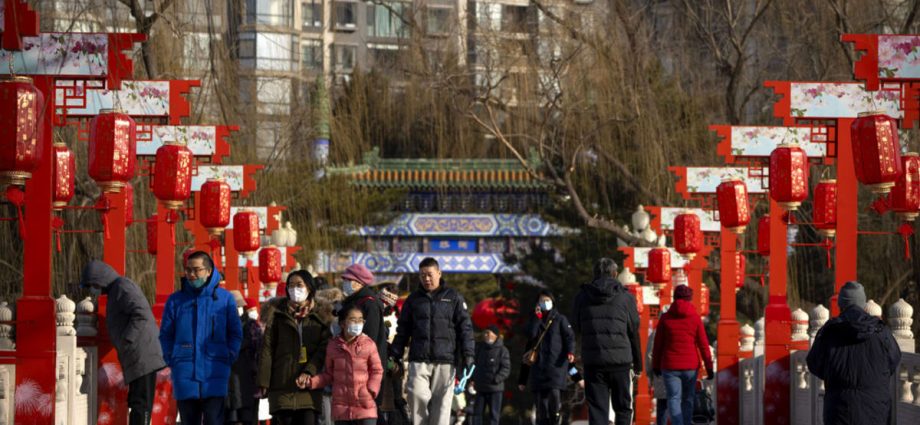 Chinese pray for health in Lunar New Year as COVID-19 death toll rises