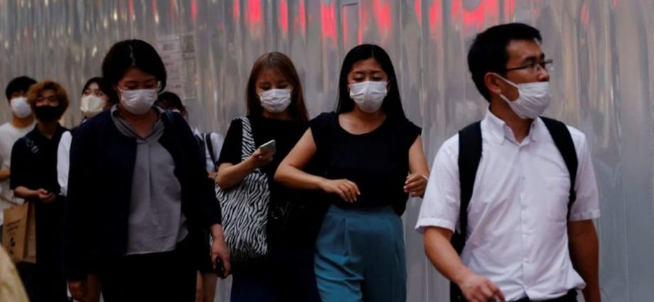 Japan to consider downgrading COVID-19 to same category as seasonal flu