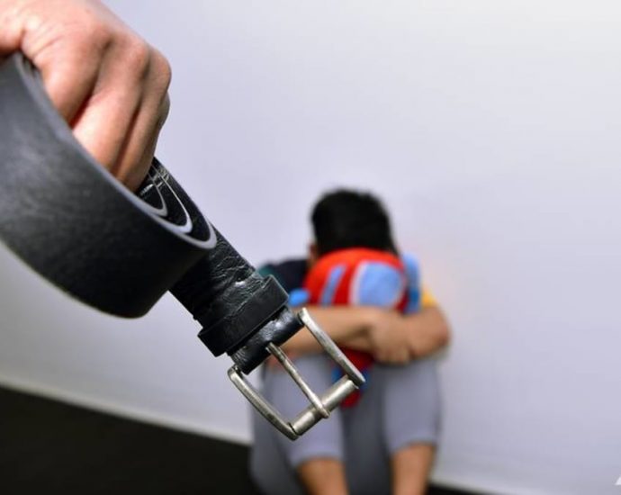 Man charged with abusing his son and daughter with belt, heated spoon and physical force