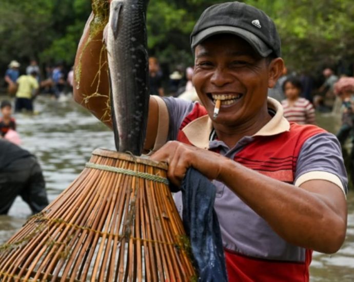 Cambodians celebrate traditional fishing methods at annual ceremony