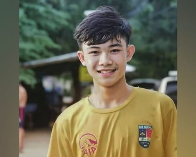 Captain of Thai boys’ football team rescued from flooded cave in 2018 dies in UK