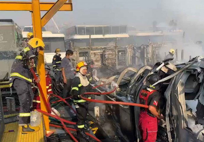 Fire damages tour boats recharging at river pier