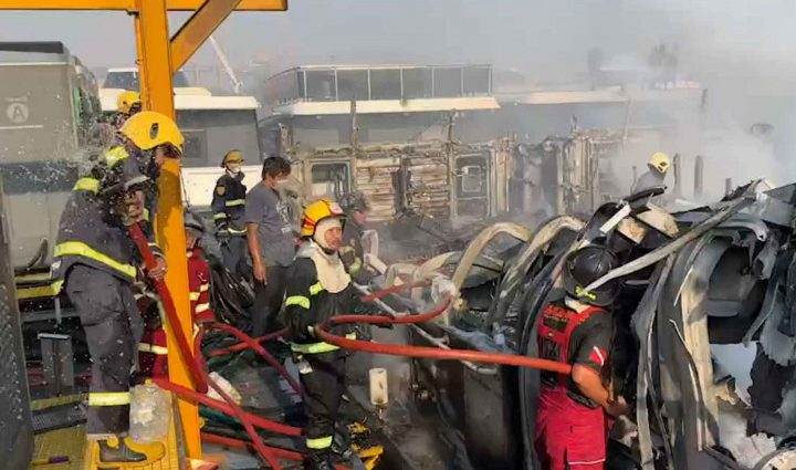 Fire damages tour boats recharging at river pier