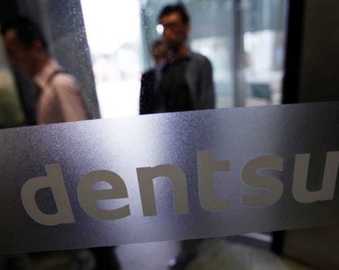 Japan ministries bar Dentsu, others from bids for 9 months over Olympic scandal