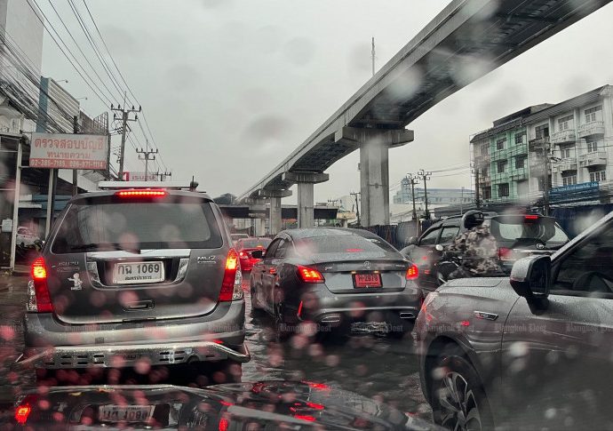 Rain pounds Bangkok, commuters stuck in traffic jams