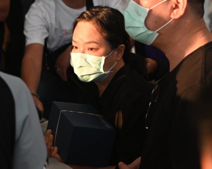 Ashes of Thai footballer rescued from cave in 2018 return to family in Thailand