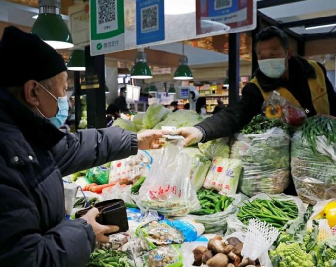 China consumer inflation slowest in a year; producer deflation deepens