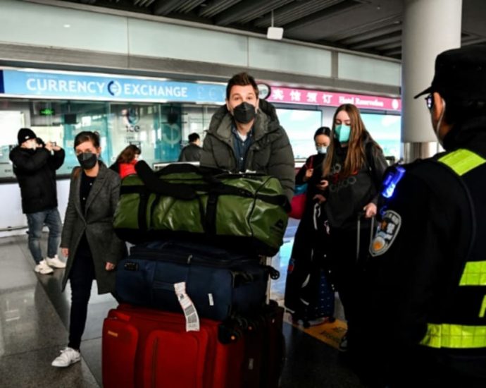 China lifts sweeping visa curbs on foreigners