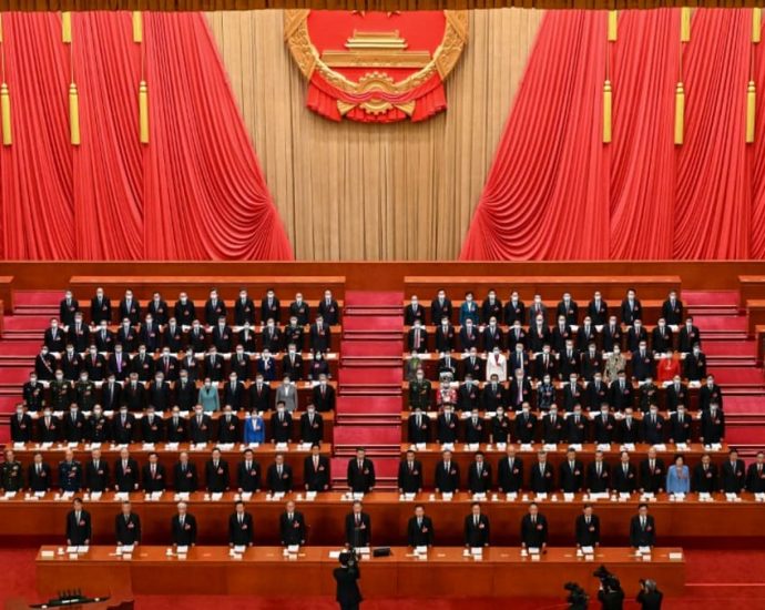 China sets lowest growth target in years as parliament kicks off; defence spending to rise