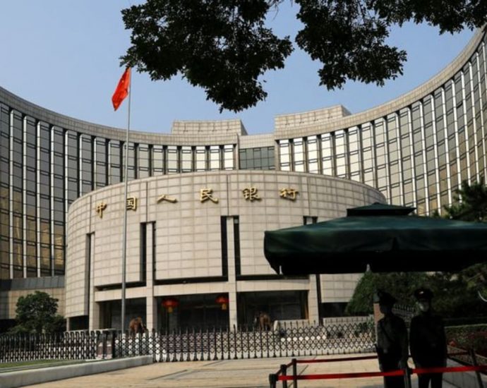 China will reduce number of high-risk institutions, defuse ‘bombs’: Central bank