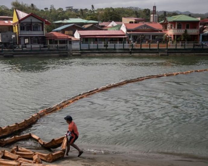 Coastal villages in limbo, millions in income lost a month after oil tanker’s sinking in Philippine waters