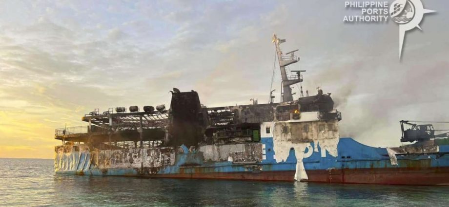 Death scene in burned Filipino ferry moves rescuers to tears