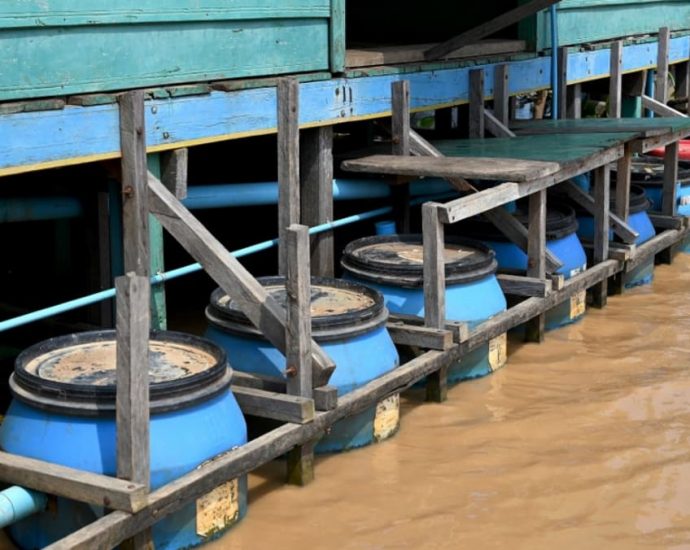 ‘Floating toilets’ help Cambodia’s lake-dwelling poor