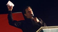 Imran Khan greets supporters after police withdraw from around ex-PM's home