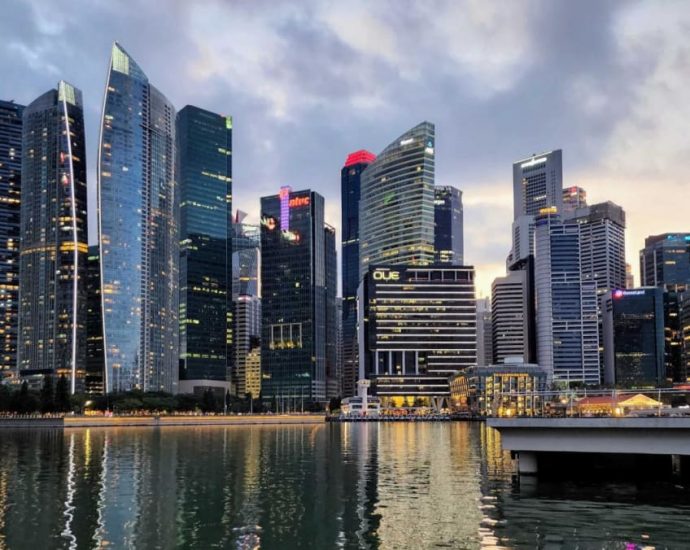 IN FOCUS: ‘No room for complacency’ as fight for global investments heats up. What can Singapore do?