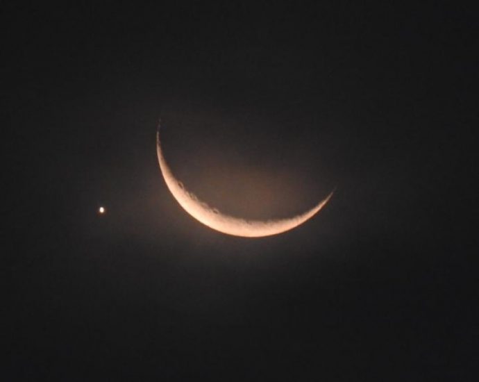 In pictures: Venus at the tip of a glowing crescent moon over Singapore