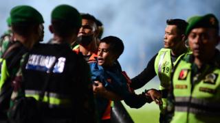 Indonesia football crush: Families devastated as police acquitted