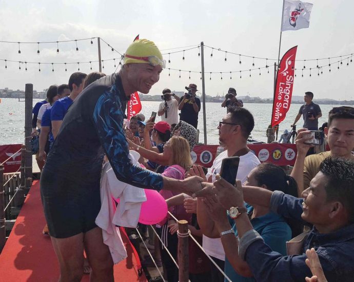 Korn swims 2km across Songkhla Lake