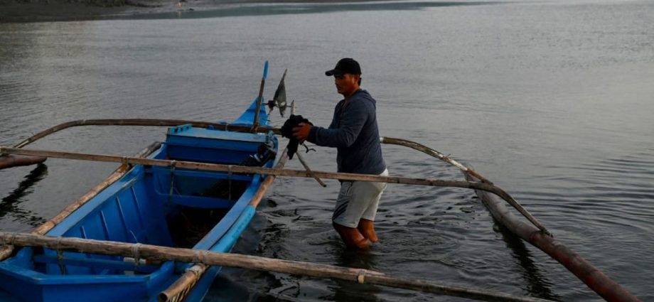 Philippine fishermen struggle as oil spill keeps them ashore