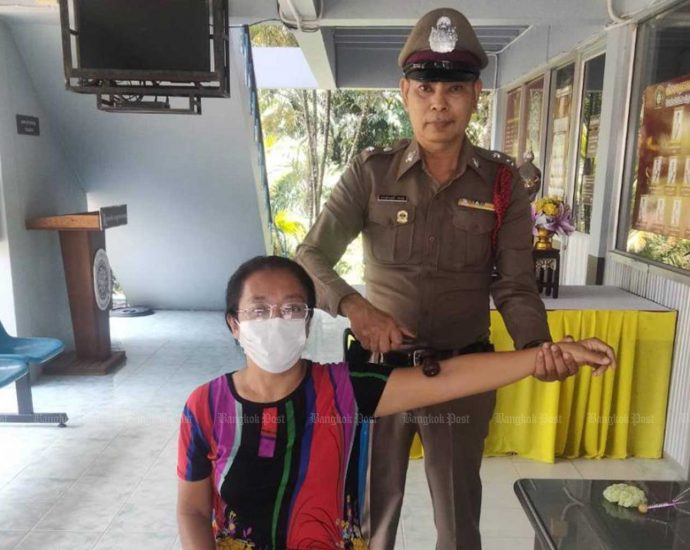 Policeman offers rub downs to calm visitors