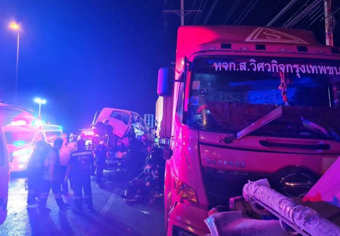 Trailer trucks crash, 3 killed, child survives