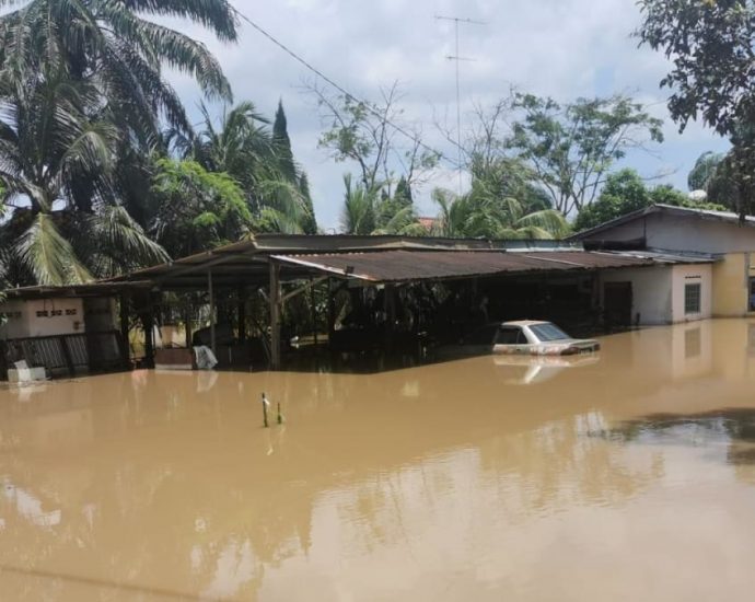 ‘When will this end?’: Flood victims in Johor’s worst-hit district long to return home as weather improves