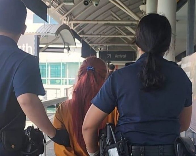 Woman arrested on ferry departing Singapore after hot water attack left man with second-degree burns