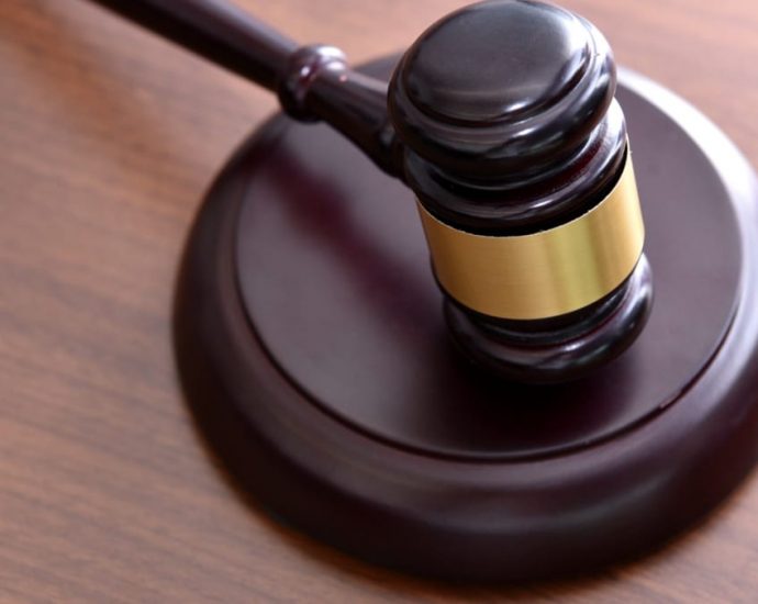 American extradited to Singapore, charged over S million fraud investment scheme