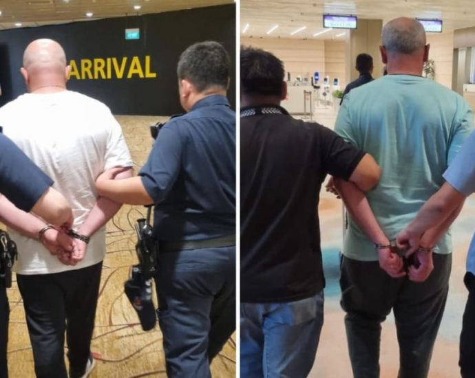 Two men accused of stealing from money changer taken off flight at Changi Airport and arrested