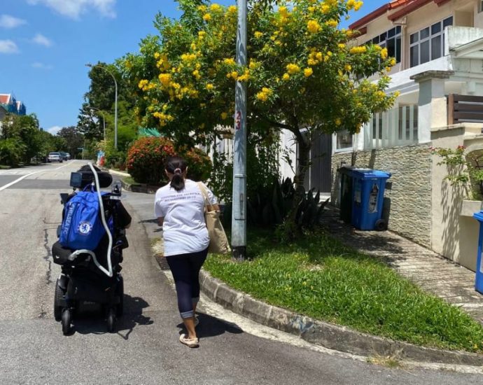 Uneven terrain, obstructed paths: This is how wheelchair users navigate public pavements in Singapore