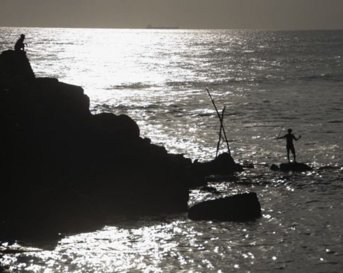 China urges Australia to help find crew of capsized fishing boat