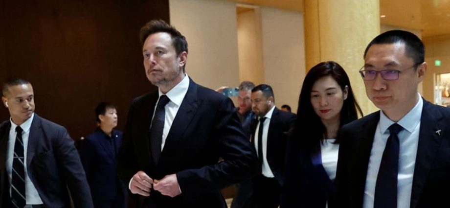 Elon Musk visits China's commerce and industry ministries