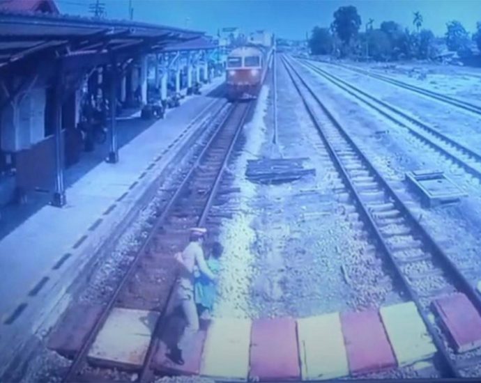 Station master saves deaf woman on tracks