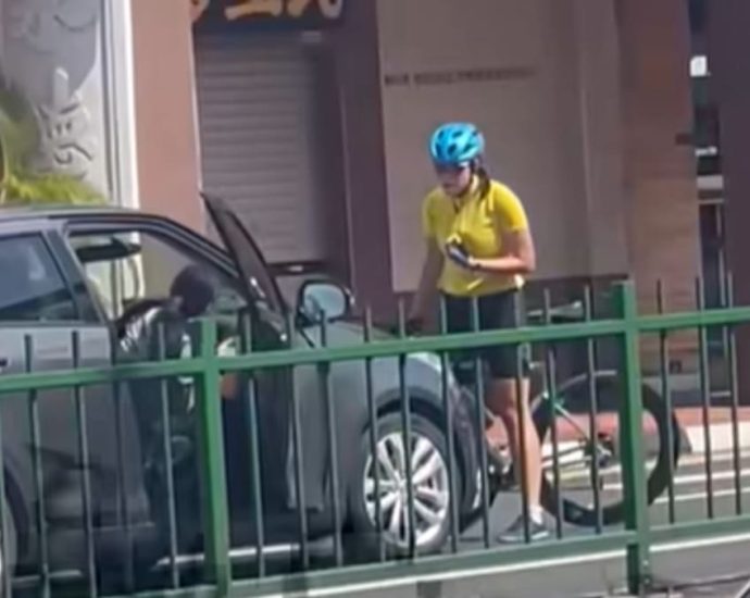 Car drives off with cyclist on bonnet after alleged altercation in Katong, 2 women assisting in police probe