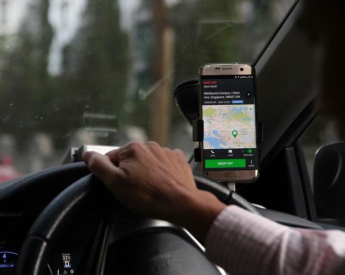 Grab driver fined for operating as taxi after ferrying street-hail passengers