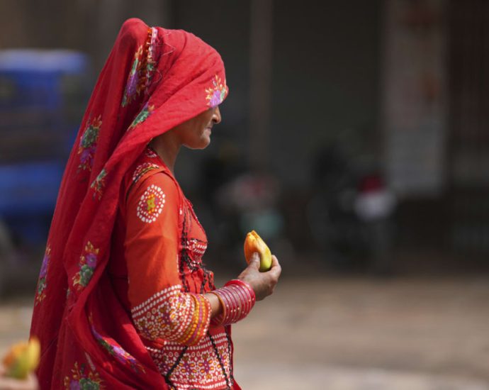 Nearly 100 die as India struggles with a sweltering heatwave in 2 most populous states