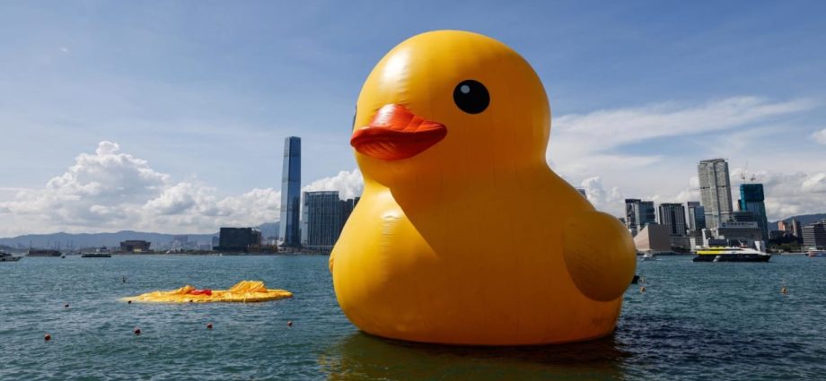 One of two giant rubber ducks in Hong Kong harbour deflates