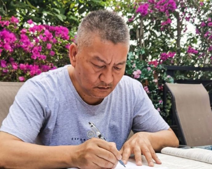 Self-made millionaire sits China’s university exams for 27th time