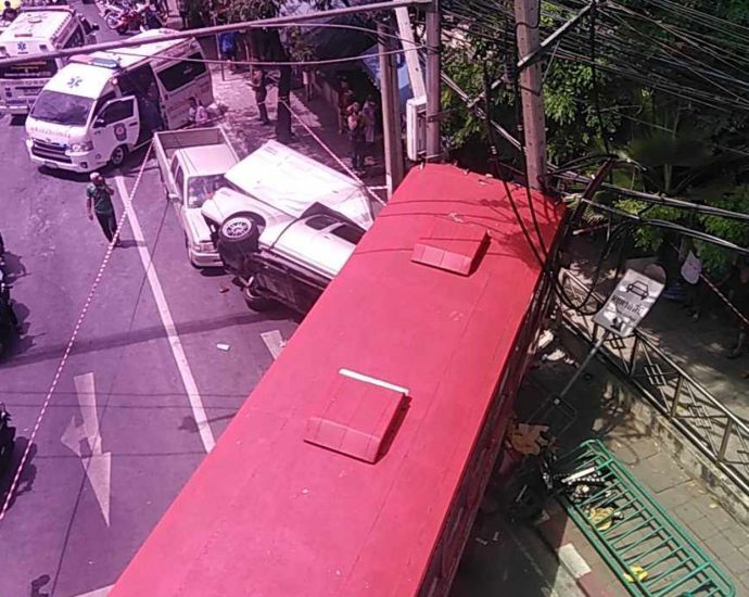 Six injured when bus rams power pole