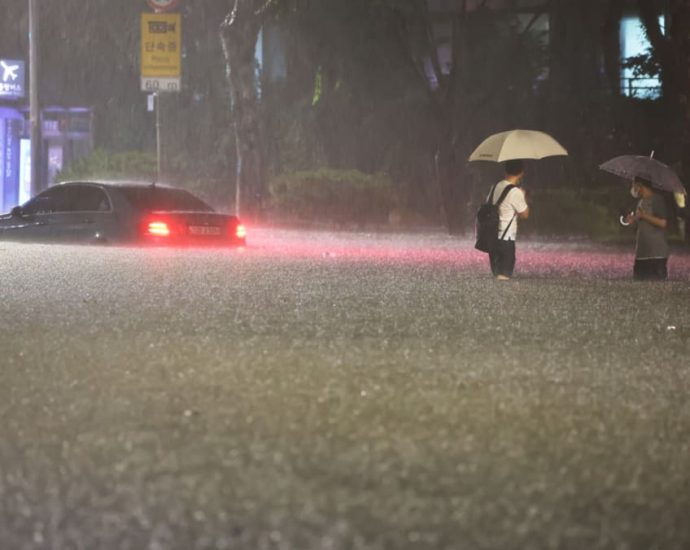 South Korea rains force evacuation of hundreds; baby dies in landslide