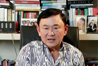 Thaksin still aiming for July return